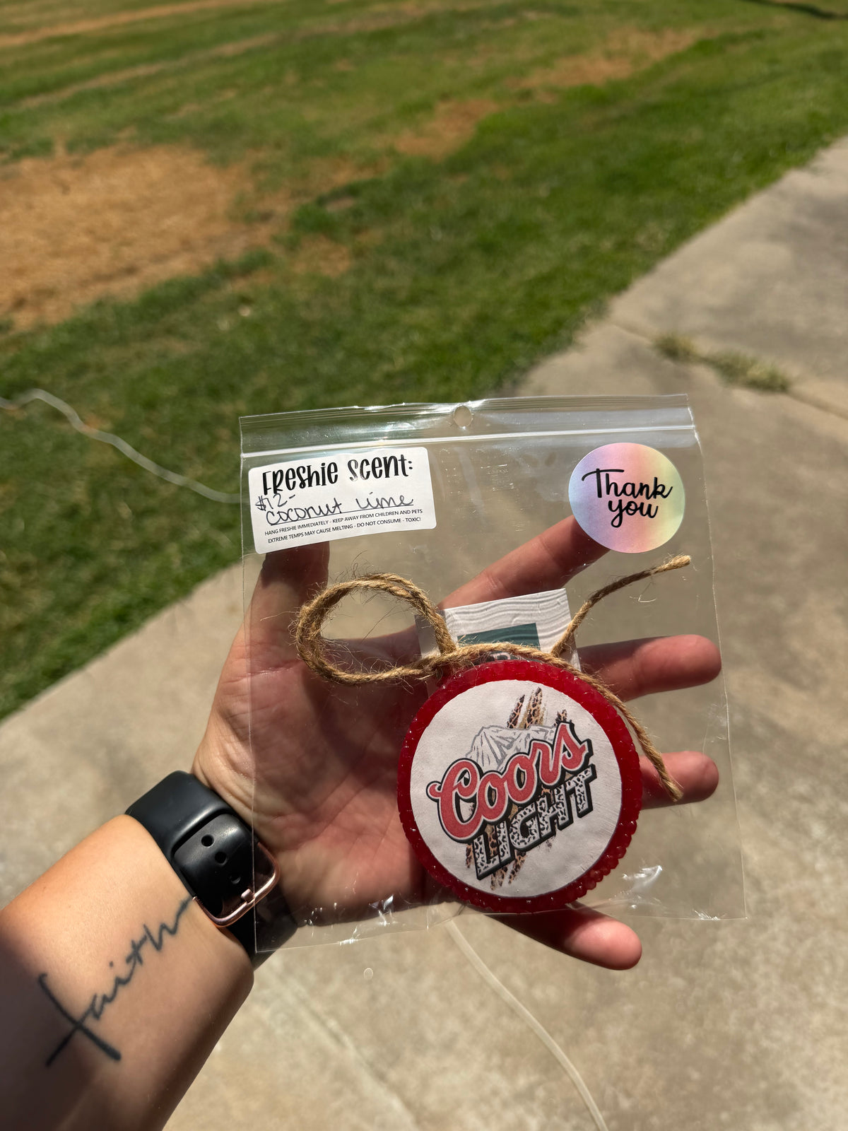 Coors light with cheetah print- scent: coconut lime